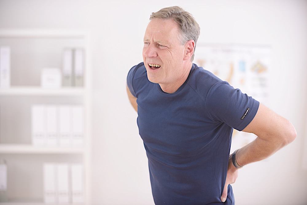 Man Suffering From Backache